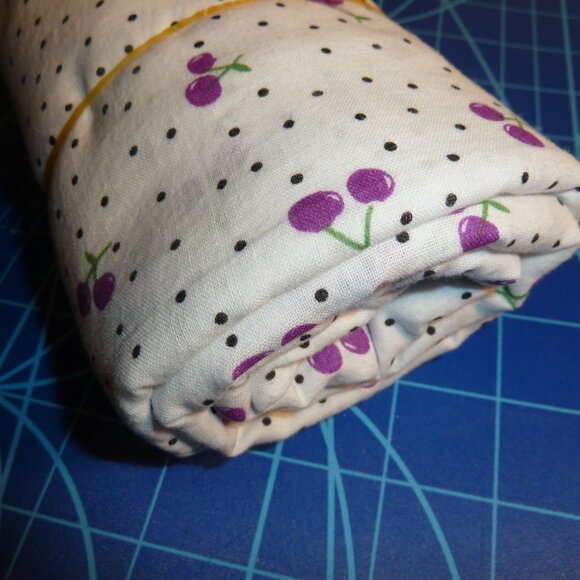 Fabric with purple cherry pattern green stems black dots white background - Picture 2 of 3